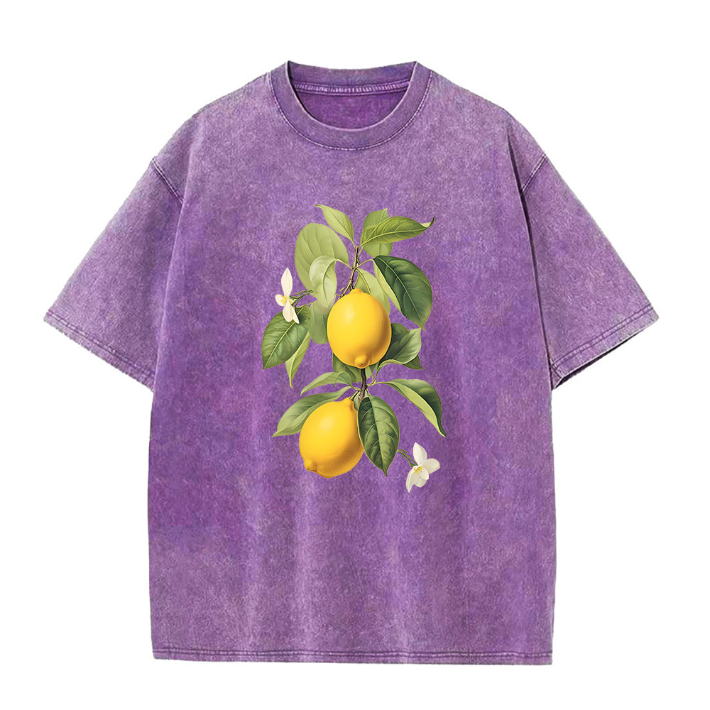 Oversized purple crew neck t-shirt with a printed lemon and leaf design in the center.