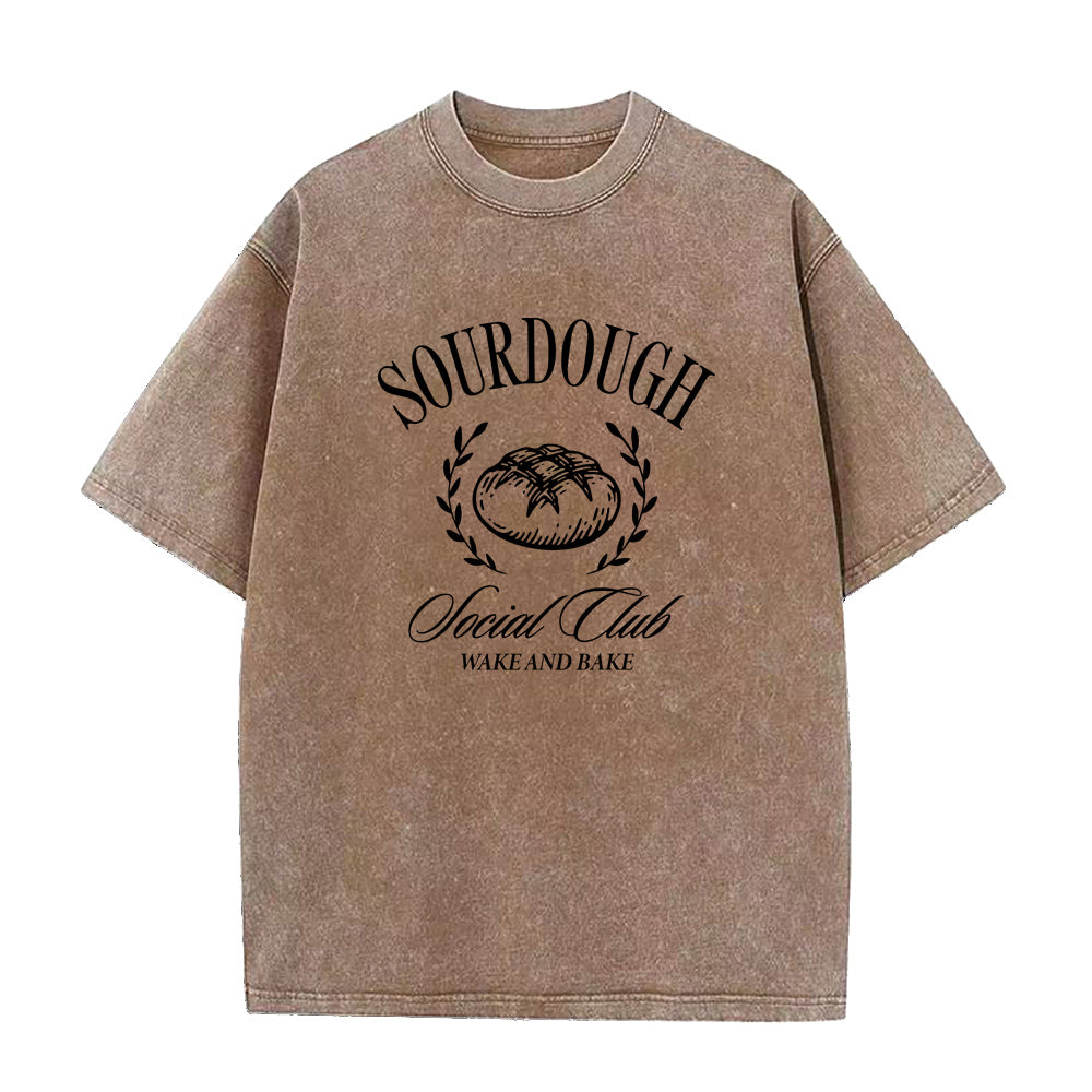 Brown t-shirt with 'Sourdough Social Club' graphic on a white background