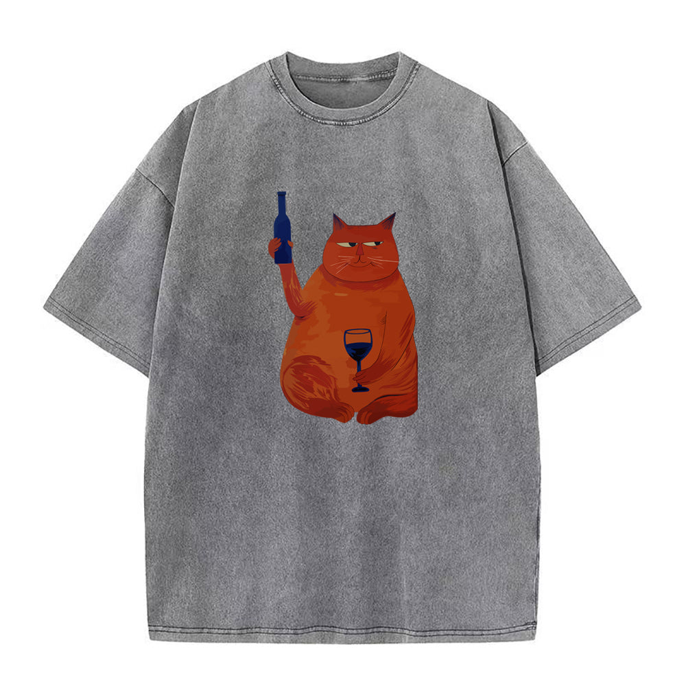 Gray t-shirt with an orange cat graphic holding a bottle and glass on a white background