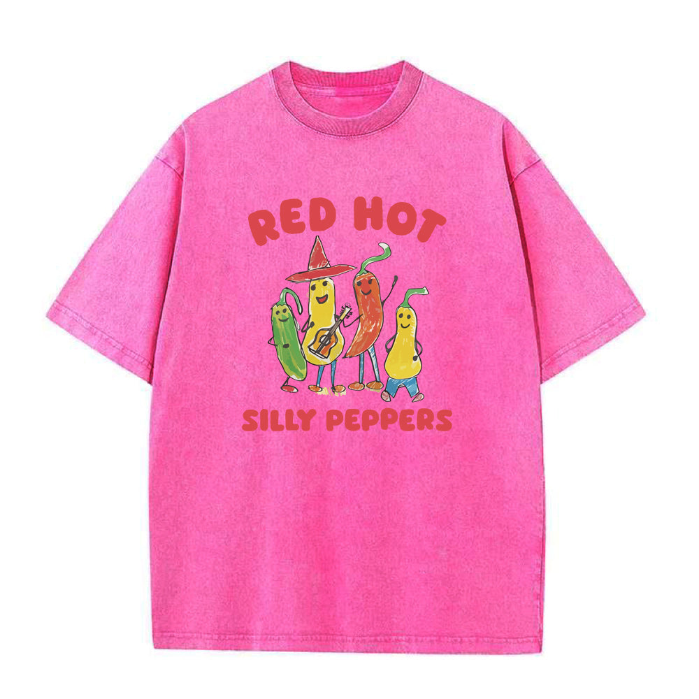 Oversized Pink t-shirt with cartoon peppers and 'Red Hot Silly Peppers' text on a white background
