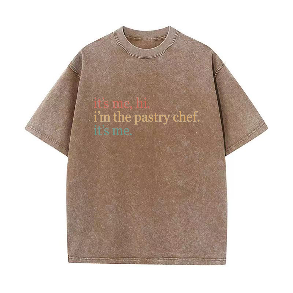 Oversized brown crew neck t-shirt with text 'it's me, hi. i'm the pastry chef.