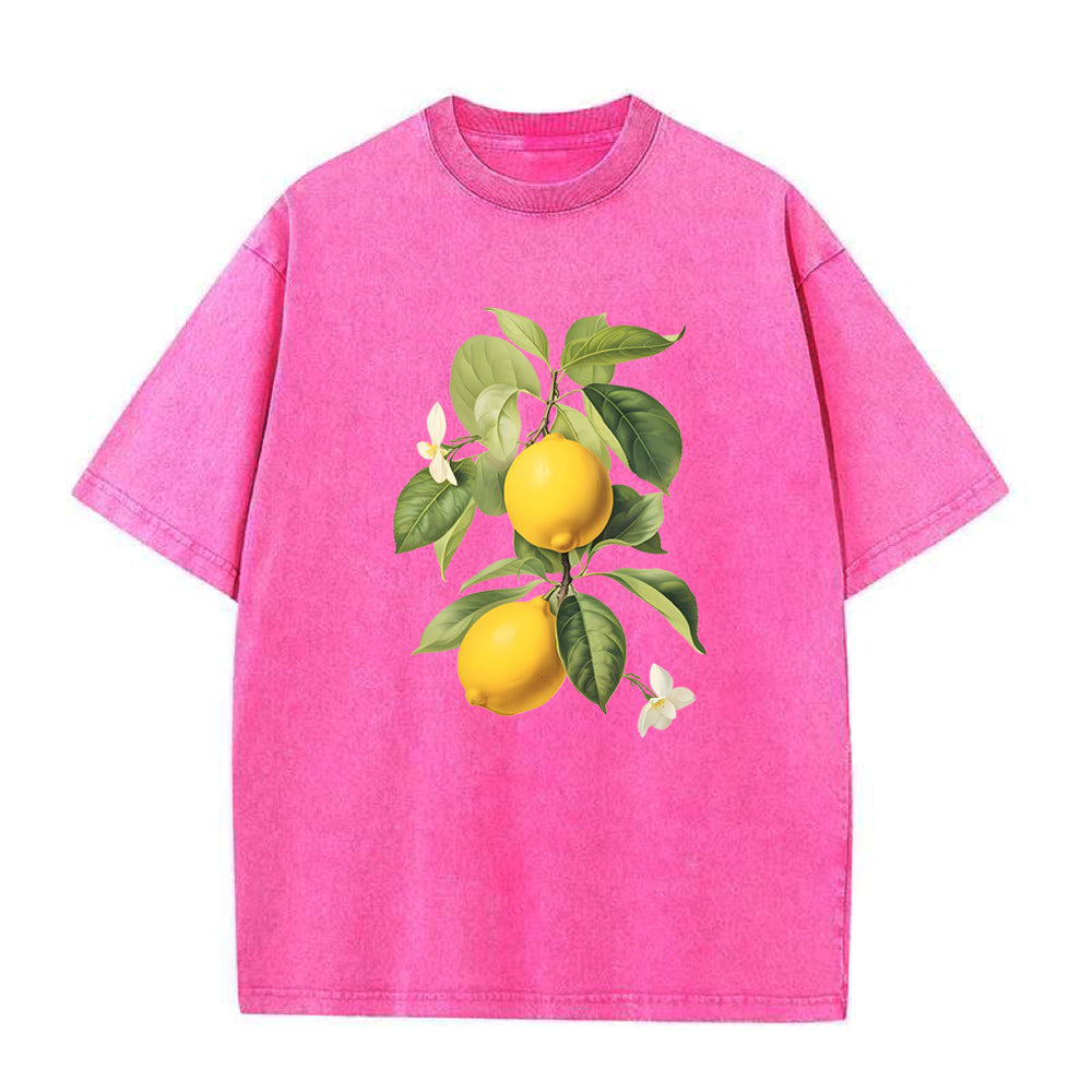 Pink t-shirt with lemon graphic on a white background