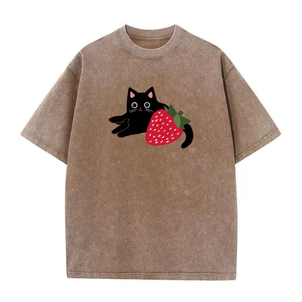 Brown t-shirt with a black cat and strawberry graphic on a white background