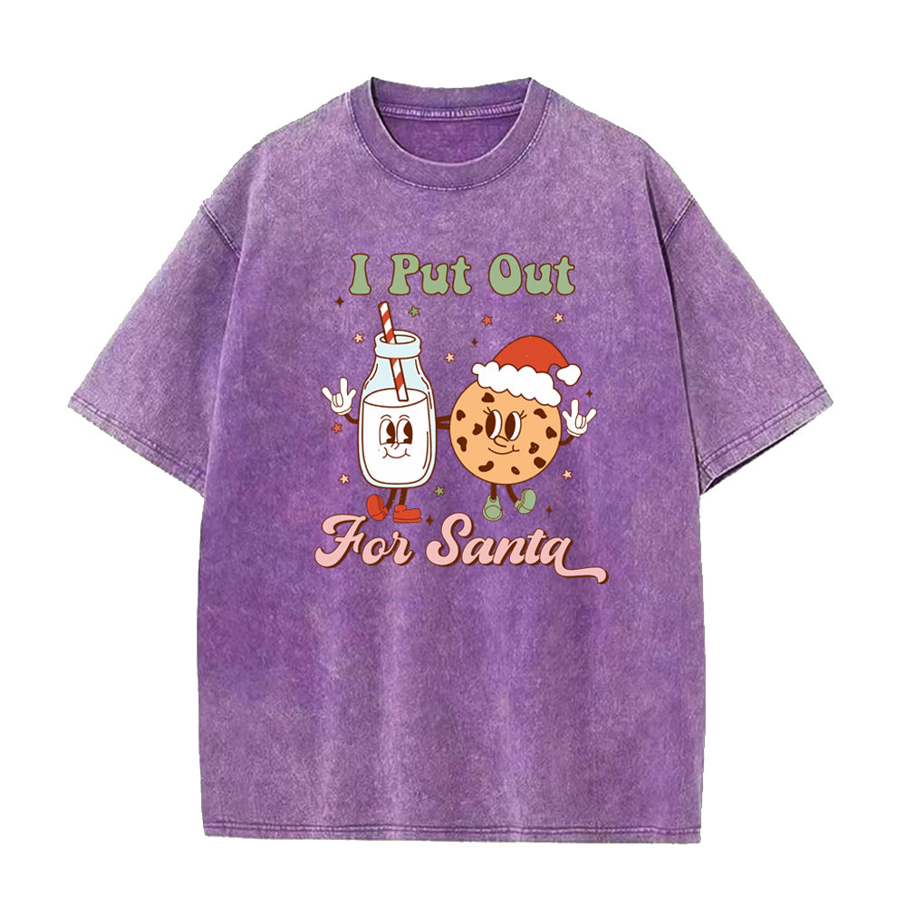 Purple t-shirt with Christmas-themed design featuring a cookie and milk bottle on a white background
