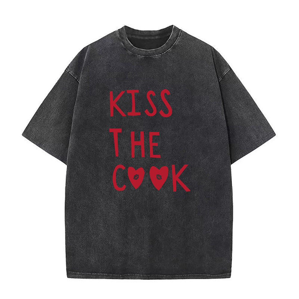 Black t-shirt with red text 'KISS THE COOK' on a white background