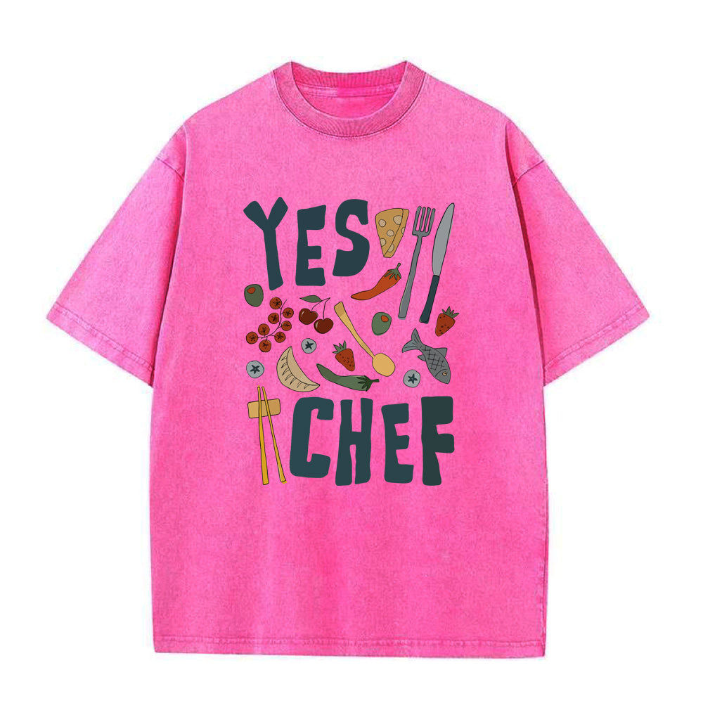 Pink t-shirt with 'YES CHEF' text and food-themed graphics on a white background