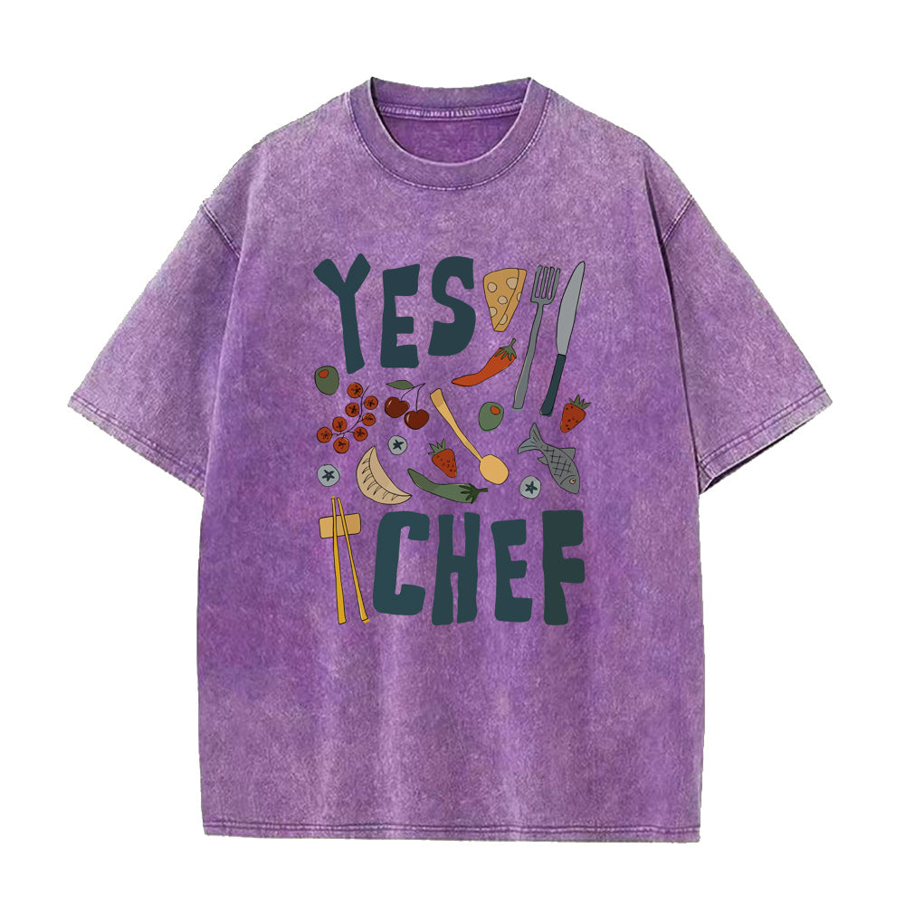 Purple t-shirt with 'YES CHEF' text and food-themed graphics on a white background