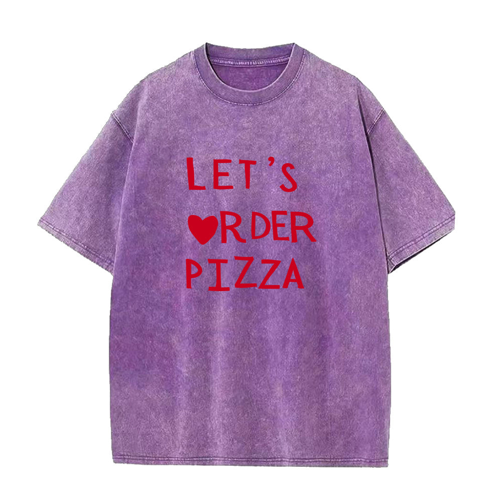 Purple t-shirt with red text 'LET'S ORDER PIZZA' on a white background