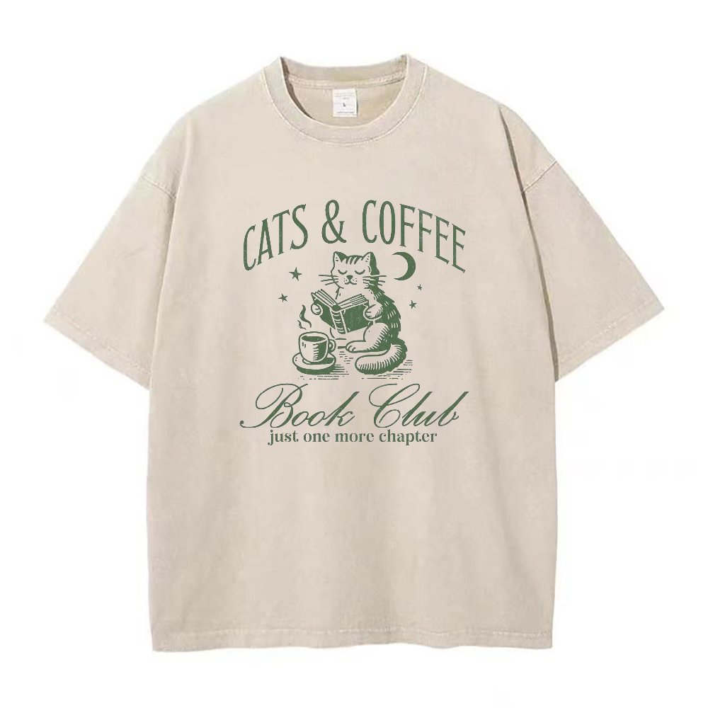 コーヒー、猫、本好きのユニセックスTシャツ