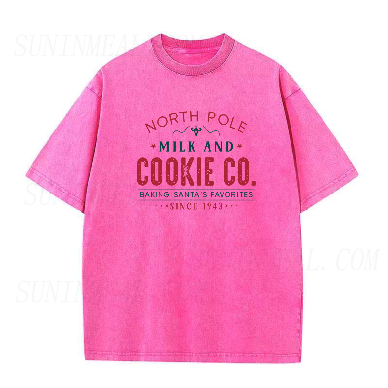 North Pole Milk And Cookie Co. Baking Santa’s Favorites Since 1943 Christmas Unisex Tee