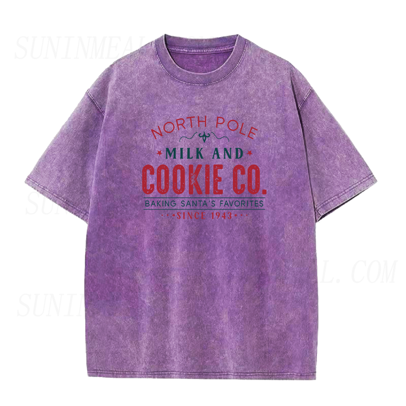 North Pole Milk And Cookie Co. Baking Santa’s Favorites Since 1943 Christmas Unisex Tee