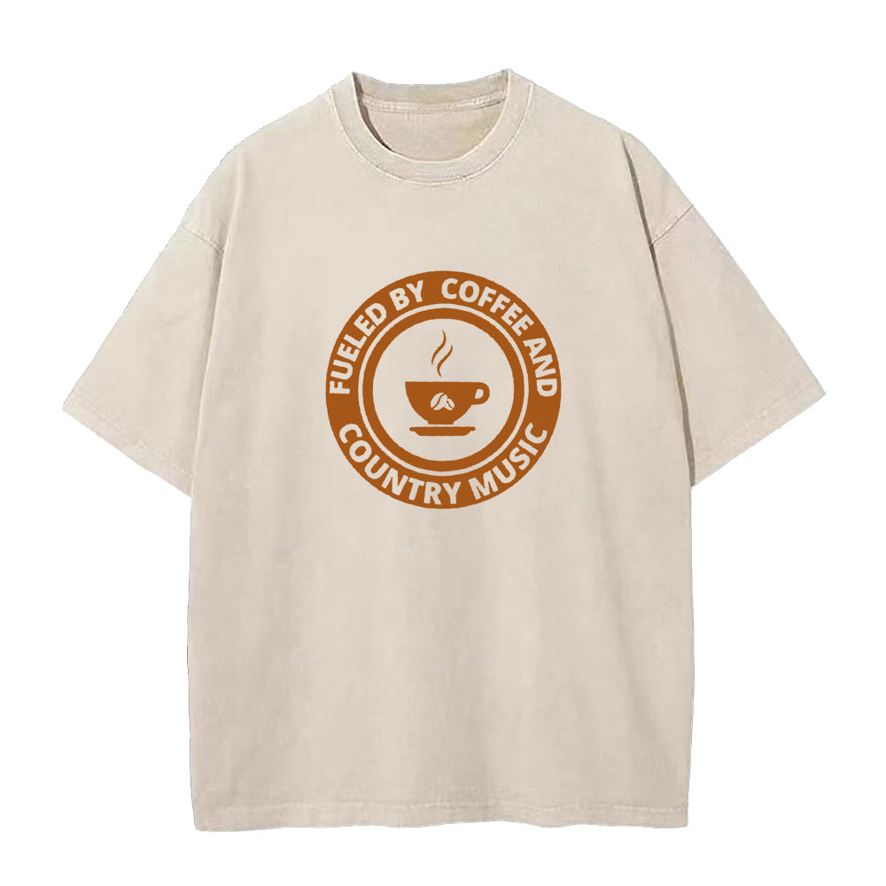 コーヒーと音楽で満たされたユニセックスTシャツ